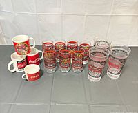 Group shot of all mugs, glasses and tumblers