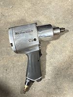 Left profile of Mastercraft impact wrench showing brand logo and grip