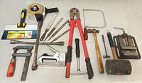 Group shot of all hand tools laid out on table