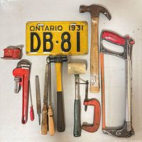 Group shot of all tools and license plate