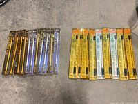 Full lot showing two groups of packaged LED tubes