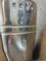 Stamping on exhaust component showing VW AG, Boysen, part number 4M0 253 211 K