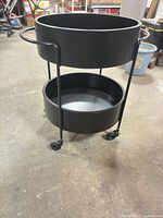 Full view of bar cart showing both shelves and casters