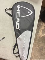 HEAD branded racket cover, black and silver, Titanium Supreme marking
