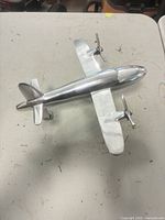 Top view showing entire polished aluminum airplane model