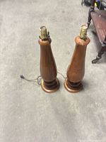 Pair of wooden table lamps full view showing height and design