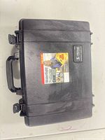 Closed Pelican case top view showing label and size