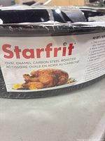 Label showing Starfrit branding and product image on wrapped roaster