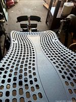 Top view of blue perforated backrest and head/neck pads
