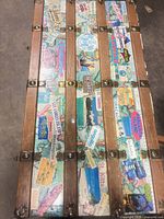 Top view showing wood slats and extensive travel decals