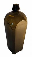 Full view of olive green glass coffin-shaped gin bottle