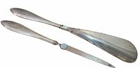 Shoehorn and nail file full view front