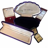 All five vintage jewelry boxes open showing interiors and Lady Hamilton branding