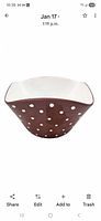 Oblique front view of brown polka-dot square bowl