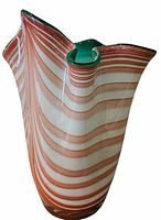 Oblique front view showing red swirl pattern and green interior