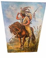 Front view of full painting featuring mounted Indigenous warrior