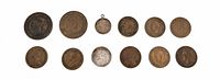 Fronts of all eleven coins and pendant in two rows