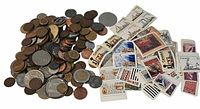 overall view of coins and stamps spread out