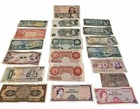 All seventeen banknotes laid out in rows for full-lot overview
