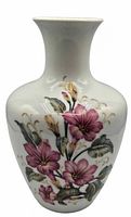 Front view of porcelain vase with floral design