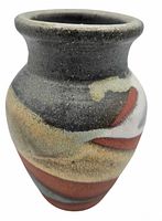 Front of stoneware vase showing swirl glaze pattern