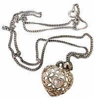 Chain with attached heart pendant laid out