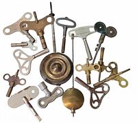 Full group of assorted keys, pendulum bobs and rods laid out