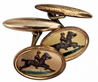 Front view showing equestrian Essex glass faces and oval plain backs