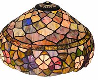 Angled view of entire stained glass shade showing colour pattern and shape
