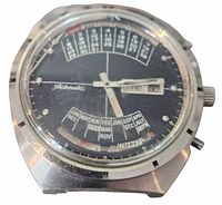 Front view showing black dial, calendar scales, damaged crystal