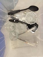 Overview of entire lot inside plastic bin