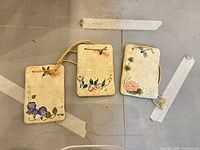 All three ceramic plaques front view