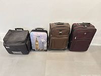 All four suitcases side by side