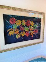 Frontal view of framed 3D botanical artwork on wall