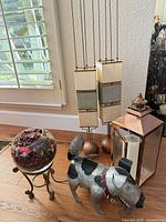 Group shot showing dog sculpture, potpourri bowl on stand, copper lantern, pair of rectangular lamps