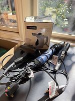 All four corded tools and steamer box displayed together