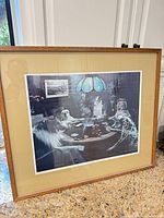 Full view of framed print with mat and wood frame