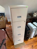 Full view of 4-drawer metal file cabinet