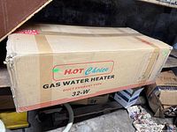 Sealed carton showing H2OT Choice Gas Water Heater branding and size