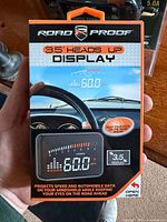 Front of boxed Road Proof 3.5" Heads Up Display showing product image and key feature text