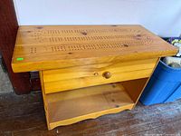 Front view of entire pine cribbage table, drawer closed