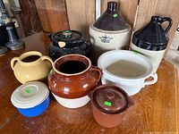Group shot of all nine stoneware pieces on table