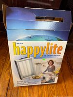 Front of retail box for Verilux Happylite sunlight simulator lamp