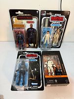 Group shot of all four sealed Star Wars figures