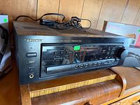 Front angled view of Optimus receiver on shelf