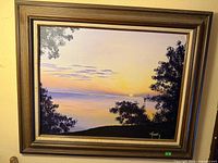 Full view of framed oil painting showing subject and frame