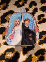 Front view showing Elsa and Anna graphic and overall color scheme