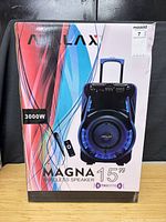 Factory-sealed box displaying Atalax Magna 15" Wireless Speaker with 3000W rating and remote