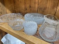 whole set on shelf showing platter, plates, bowls, relish dish