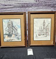 Both framed prints side by side showing overall condition and subject matter